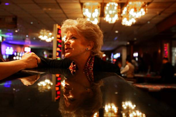 Las Vegas mayor candidate Carolyn Goodman schmoozes with a potential voter during a campaign event this month at El Cortez.