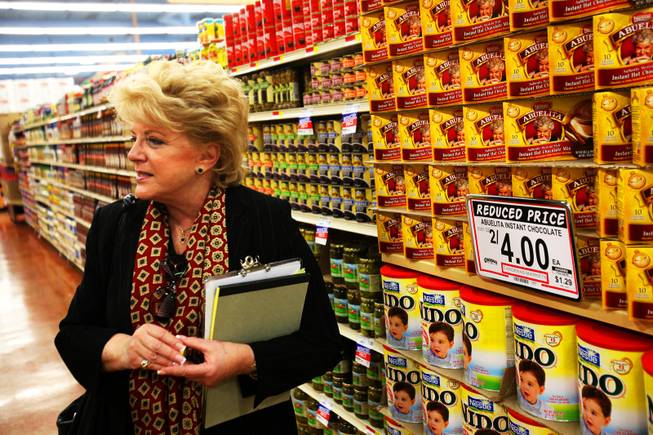 Las Vegas mayoral candidate, Carolyn Goodman, talks with patrons of Cardenas Market in Las Vegas Friday, February 11, 2011 as she campaigns for the seat being left by her husband.