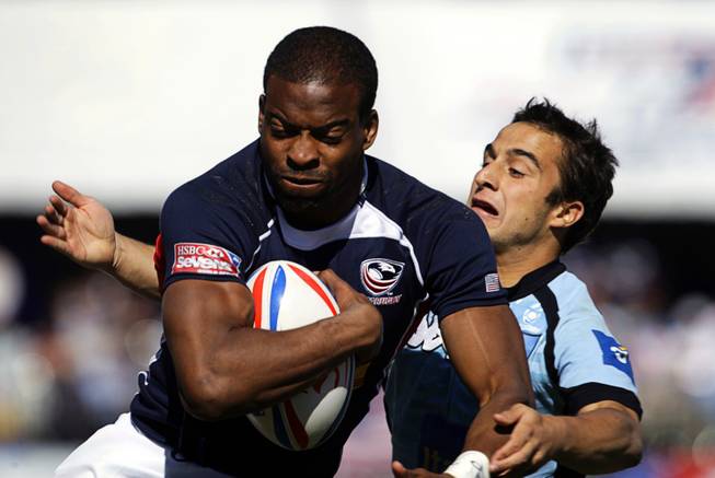 Miles Craigwell (#7) of the USA carries the ball against Uruguay during the 2011 USA Sevens Rugby World Series at Sam Boyd Stadium Sunday, February 13, 2011. The USA team won a 27-7  victory over Uruguay, then beat Japan 19-12 to win the Shield final.