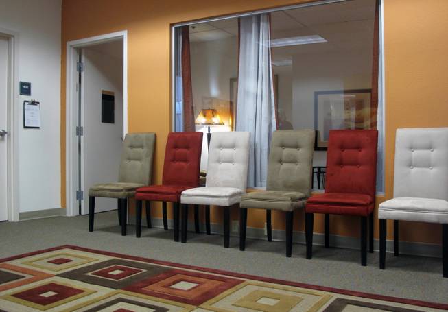 Chairs line a wall of a main meeting room at the Rape Crisis Center's Signs of Hope Counseling Center. The center, which opened Feb. 16, 2011, serves victims of sexual assault age 12 and older. Behind the chairs is a private, smaller room for discussions with victims and their family and friends.