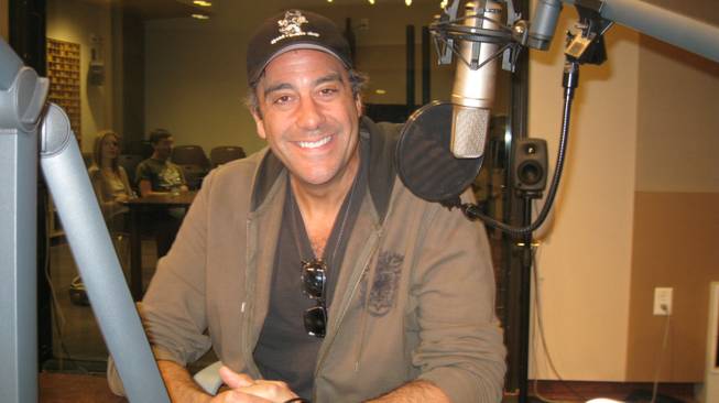 Brad Garrett, showing either a smile or grimace.