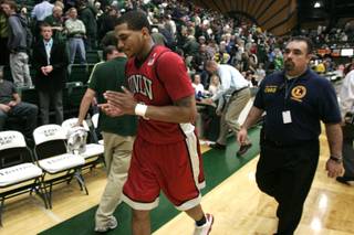 UNLV guard Anthony Marshall quietly claps to himself while leaving the court after the Rebels beat Colorado State in their Mountain West Conference game 68-61 at Moby Arena Saturday, February 19, 2011 in Fort Collins.