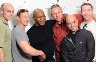 Mike Tyson with fans at Memorabilia International.