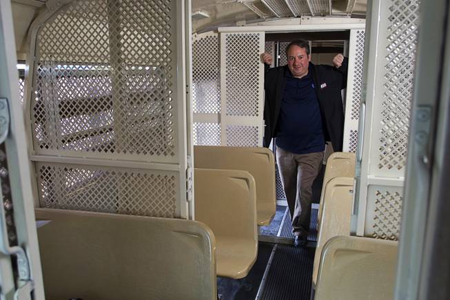 Jay Bloom, managing partner of the Las Vegas Mob Experience, poses in a prison bus at the Tropicana Tuesday, March 1, 2011. The $25 million Mob Experience will officially open March 29. The bus was originally to provide transportation to the experience but will instead be converted into a ticket booth, Bloom said.