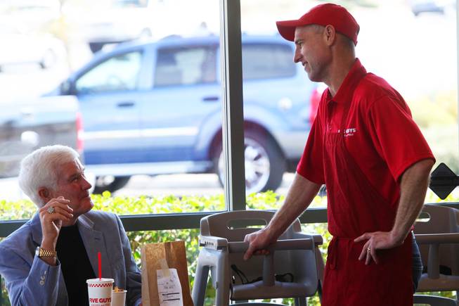 Franchise owners James Cameron, left, and Mike Cummings talk at the new Five Guys Burgers and Fries in Henderson on Wednesday, March 2, 2011. The location, on Eastern Avenue, is the first in Nevada.
