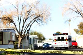 Metro Police investigate the deaths of an elderly couple in their home Thursday afternoon in the 3700 block of S. Nellis Boulevard. 