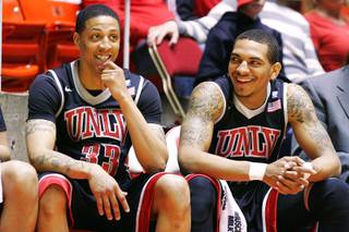 UNLV guards Tre'Von Willis and Anthony Marshall smile on the bench late in the game as the Runnin' Rebels cruised past Utah 78-58 during their Mountain West Conference season finale Saturday, March 5, 2011 at the Huntsman Center in Salt Lake City.