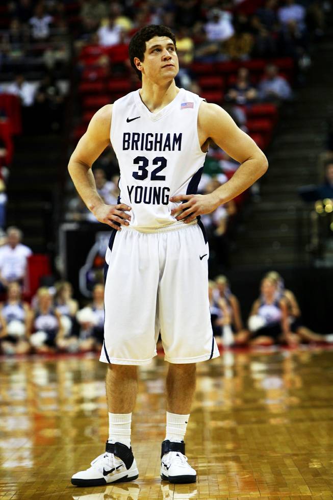 Jimmer Fredette of BYU reacts to an offensive foul during the quarterfinal game against TCU in the Mountain West Conference tournament Thursday, March 10, 2011.