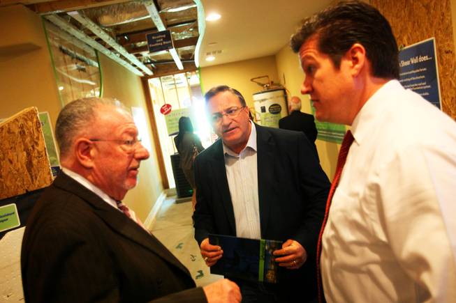 Mayor Oscar Goodman, left, chats with C.R. Herro, center, and ...