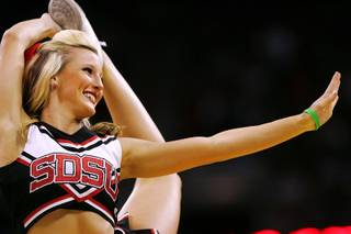A San Diego State cheerleader performs during a break in action in their Mountain West Conference Championship title game against BYU March 12, 2011 at the Thomas & Mack Center. San Diego State won 72-54.