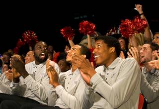 Members of the UNLV men's basketball team celebrate as their name is announced in a NCAA tournament selection show being shown at the Cox Pavilion at UNLV on Sunday, March 13, 2011. The Rebels will play Illinois on Friday in Tulsa, Okla.