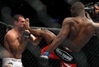 Jon Jones, right, kicks  Mauricio Rua  during their mixed martial arts match at UFC 128  Saturday, March 19, 2011, in Newark, N.J. Jones won by TKO.