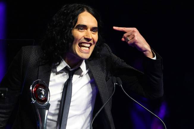 British actor Russell Brand accepts his award for Comedy Star of the Year during CinemaCon, the official convention of the National Association of Theatre Owners, at Caesars Palace March 31, 2011.