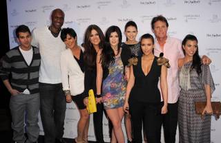 Rob Kardashian, Lamar Odom, Kris Jenner, Khloe Kardashian, Kylie Jenner, Kendall Jenner, Kim Kardashian, Bruce Jenner and Kourtney Kardashian attend the Khloe Kardashian Odom And Lamar Odom Fragrance Launch For 