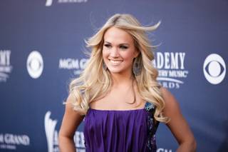 Carrie Underwood arrives at the 46th Academy of Country Music Awards at MGM Grand Garden Arena on April 3, 2011.