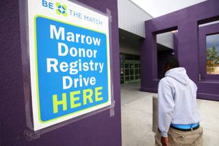 A volunteer enters the Dr. William U. Pearson Community Center in Las Vegas during the bone marrow registration drive was held Saturday, April 9, 2011. The drive was for  Las Vegan Jeffery Watkins and other African-Americans in need of bone marrow transplants.