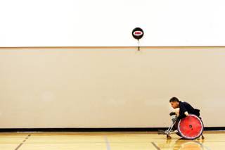 Player Sean Ladner rushes down the court during Sin City Skulls quad rugby practice at Chuck Minker Sports Complex in Las Vegas Monday, April 11, 2011.
