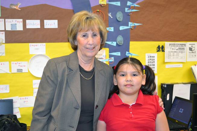 Clark County Commission Chair Susan Brager poses with third-grader Abigail Lemus after Brager announced that Lemus won the annual Mojave Max Emergence Contest for guessing when the desert tortoise would come out of his burrow this spring.