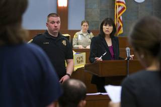Judge Jackie Glass speaks to an in-custody offender during a mental health court hearing at the Regional Justice Center on Thursday, April 28, 2011.