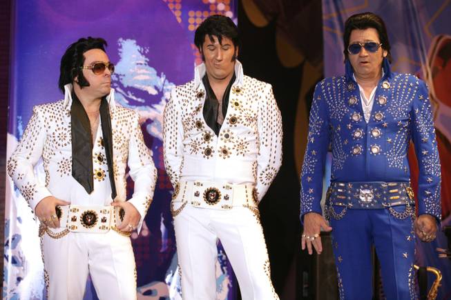 From left, Jimmi Ellis, Mark Anthony and Dale Kenny wait for the announcement of finalists during the second annual Las Vegas Ultimate Elvis Tribute Artist Contest Saturday, May 7, 2011 at the Fremont Street Experience.