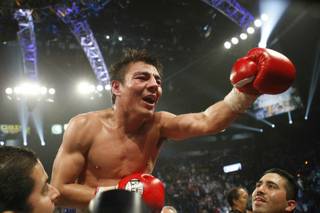 Jorge Arce of Mexico celebrates his victory over  WBO super bantamweight champion Wilfredo Vazquez of Puerto Rico after their title fight at the MGM Grand Garden Arena on May 7, 2011.
