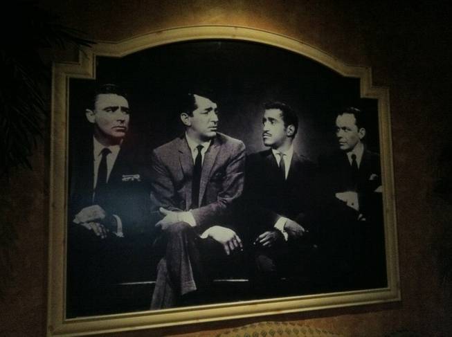 A photo of members of The Rat Pack at the entrance of the House of Lords at Sahara.