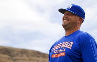 First-year Bishop Gorman High School baseball coach Nick Day is shown during practice at the school Tuesday, May 17, 2011. Gorman opens Thursday against Green Valley High School, which is Day's alma mater. Day, one of the best players in Green Valley history, helped the school win a state-record six consecutive crowns in the mid-1990s. Gorman, the five-time defending state champs, is looking to equal Green Valley's mark this year.