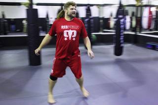 Roy Nelson warms up for a work out as he prepares for his upcoming fight against Frank Mir at UFC 130 Thursday, May 19, 2011.