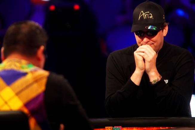 Phil Hellmuth Jr. thinks about his next move against Johnny Chan as they go head-to-head during a WSOP Grudge Match, which pitted the 1989 Main Event finalists against each other again in an ESPN made-for-TV event at the Rio on Thursday, June 2, 2011.