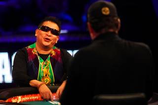 Johnny Chan folds against Phil Hellmuth Jr. as they go head-to-head during a WSOP Grudge Match, which pitted the 1989 Main Event finalists against each other again in an ESPN made-for-TV event at the Rio on Thursday, June 2, 2011.