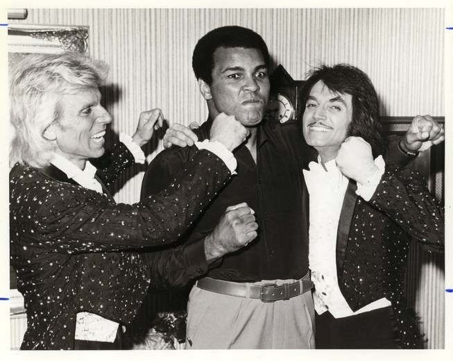 Controversial and whimsical, flamboyant and powerful, few legends encapsulate Old Vegas like headliners Siegfried and Roy. Here, during a photo-op in October 1980, the pair throw faux punches at boxing icon Muhammad Ali; all of whom have been represented by Bernie Yuman. The Greatest and magicians of a past era, joking around like kids. Now this is Old Vegas. 