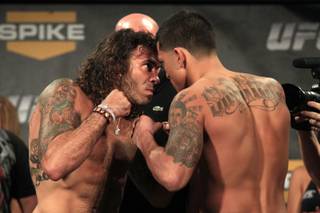Clay Guida and Anthony Pettis face off during the weigh in for the TUF Season 13 fight card Thursday, June 2, 2011.