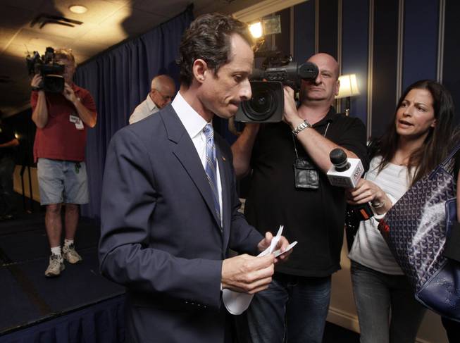 U.S. Rep. Anthony Weiner, D-N.Y., is pursued by the media as he leaves a news conference in New York, Monday, June 6, 2011. 