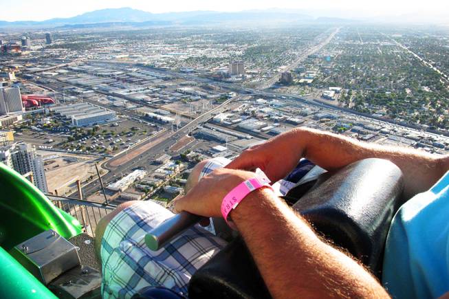 A rider is ready to ride the X-Scream at the top of the Stratosphere in Las Vegas Tuesday, June 7, 2011