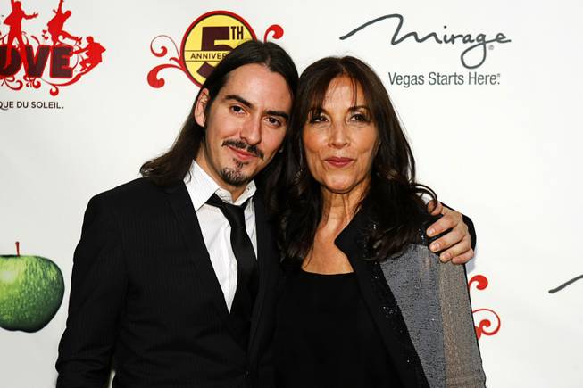 Recording artist Dhani Harrison and his mother Olivia Harrison arrive for the fifth-anniversary celebration of "The Beatles Love by Cirque du Soleil"  at the Mirage on Wednesday, June 8, 2011.