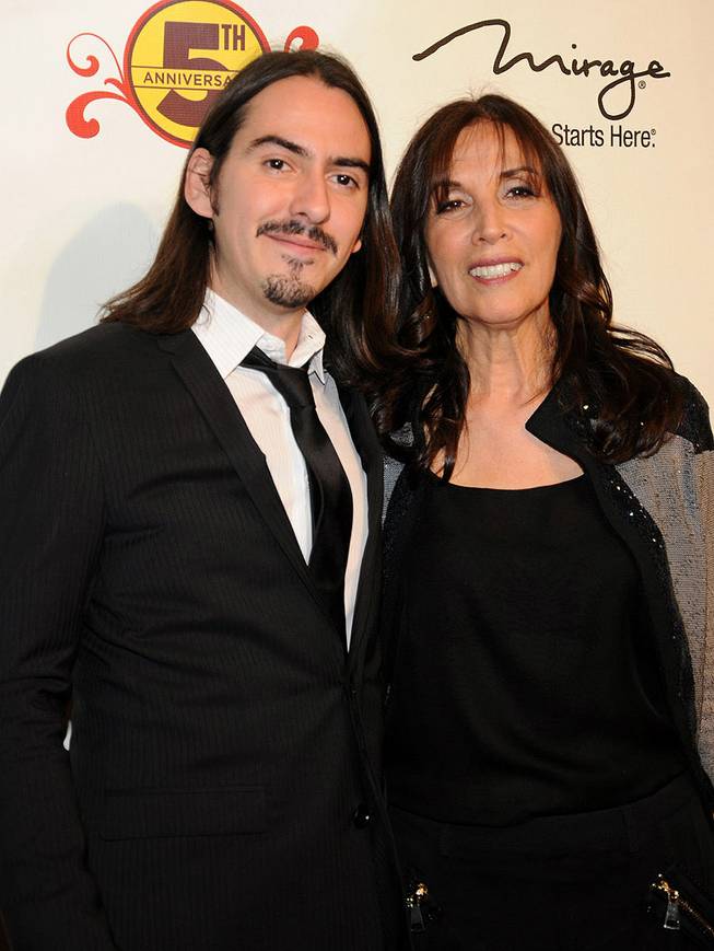Dhani Harrison and his mother, Olivia Harrison, at the fifth-anniversary celebration of <em>The Beatles Love by Cirque du Soleil</em> at the Mirage on June 8, 2011.

