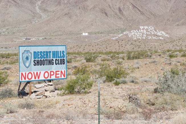 The Desert Hills Shooting Club sign is seen south of Boulder City. 