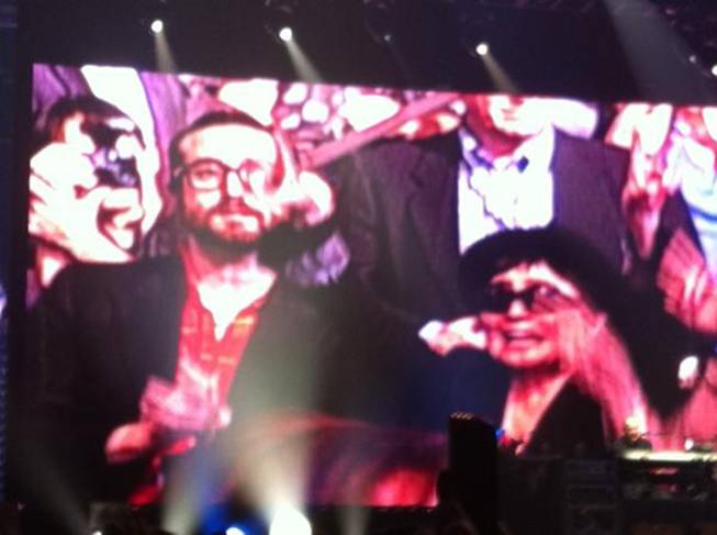 Sean Lennon and Yoko Ono, shown on an MGM Grand Garden Arena video panel, during "Give Peace a Chance" at Friday's Paul McCartney concert.