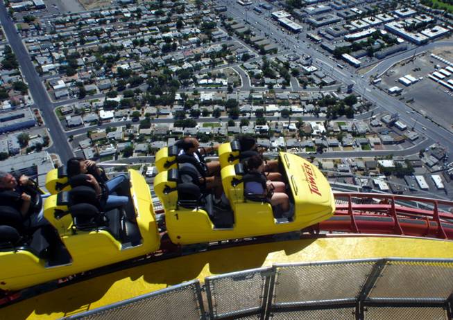 Thrill seekers ride the High Roller roller coaster at the Stratosphere Tower hotel-casino Sunday, September 9, 2001. 