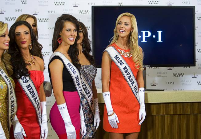 Miss Nevada USA Sarah Chapman, right, and other contestants attend an event at the salon Color at Caesars Palace on Tuesday, June 14, 2011. 