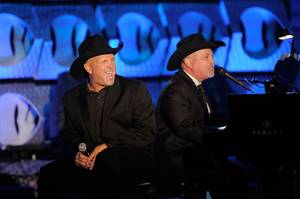 Garth Brooks and Billy Joel at the Songwriters Hall of Fame in New York City on June 16, 2011.