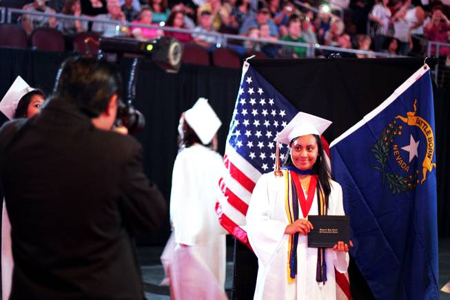 Juana Rincon poses for a photo during the Chaparral High School graduation ceremony at the Orleans Arena in Las Vegas Monday, June 20, 2011.