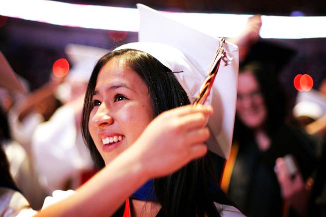 Valedictorian Juana Garcia switches her tassel from one side to the other during the Chaparral High School graduation ceremony at the Orleans Arena in Las Vegas Monday, June 20, 2011.
