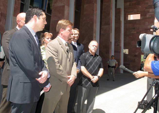The Las Vegas Police Protective Association filed legal petitions Tuesday in Clark County District Court to block changes to the coroner's inquest process, alleging the changes are unconstitutional. The police union's executive director, Chris Collins (front and center), addresses the media Tuesday morning.