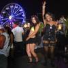 Tina Venegas, left, and Tyra Ward dance to the music of Swedish House Mafia during the Electric Daisy Carnival at the Las Vegas Motor Speedway Sunday June 26, 2011.
