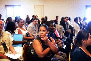 Meghan Allen waits to be called for a screening interview during a job fair for the Plaza Hotel & Casino at Las Vegas Club in downtown Las Vegas Monday, June 27, 2011.