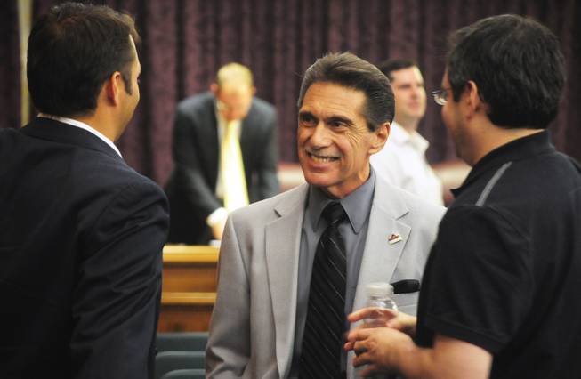 North Las Vegas Councilman Richard Cherchio smiles after a special ...
