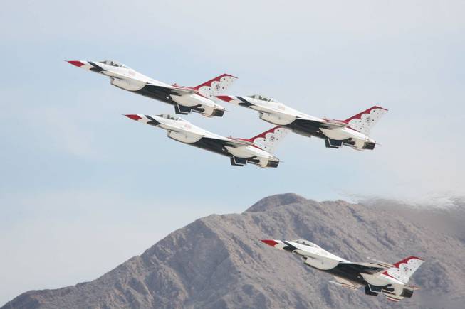 F-16 jets from the U.S. Air Force Air Demonstration Squadron Thunderbirds perform during their annual show at Nellis Air Force Base in 2009. Nellis officials on Thursday confirmed that an F-16 pilot died in a Tuesday crash near Caliente. 