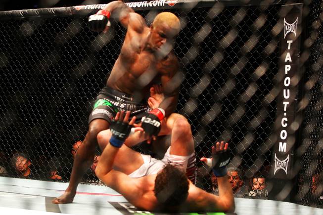 Melvin Guillard winds up to hit Shane Roller in their lightweight bout at UFC 132 Saturday, July 2, 2011, at the MGM Grand Garden Arena in Las Vegas. Guillard won by knockout in the second round.