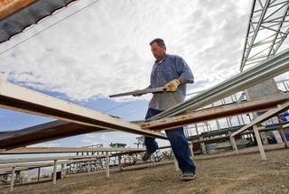 Inmate worker demonstrates truss building at the M-Truss and Components Inc. facility outside the Southern Desert Correctional Center in Indian Springs Wednesday, July 6, 2011. The company is owed $30,000 for work on the Cosmopolitan, said owner Cathy McBride.